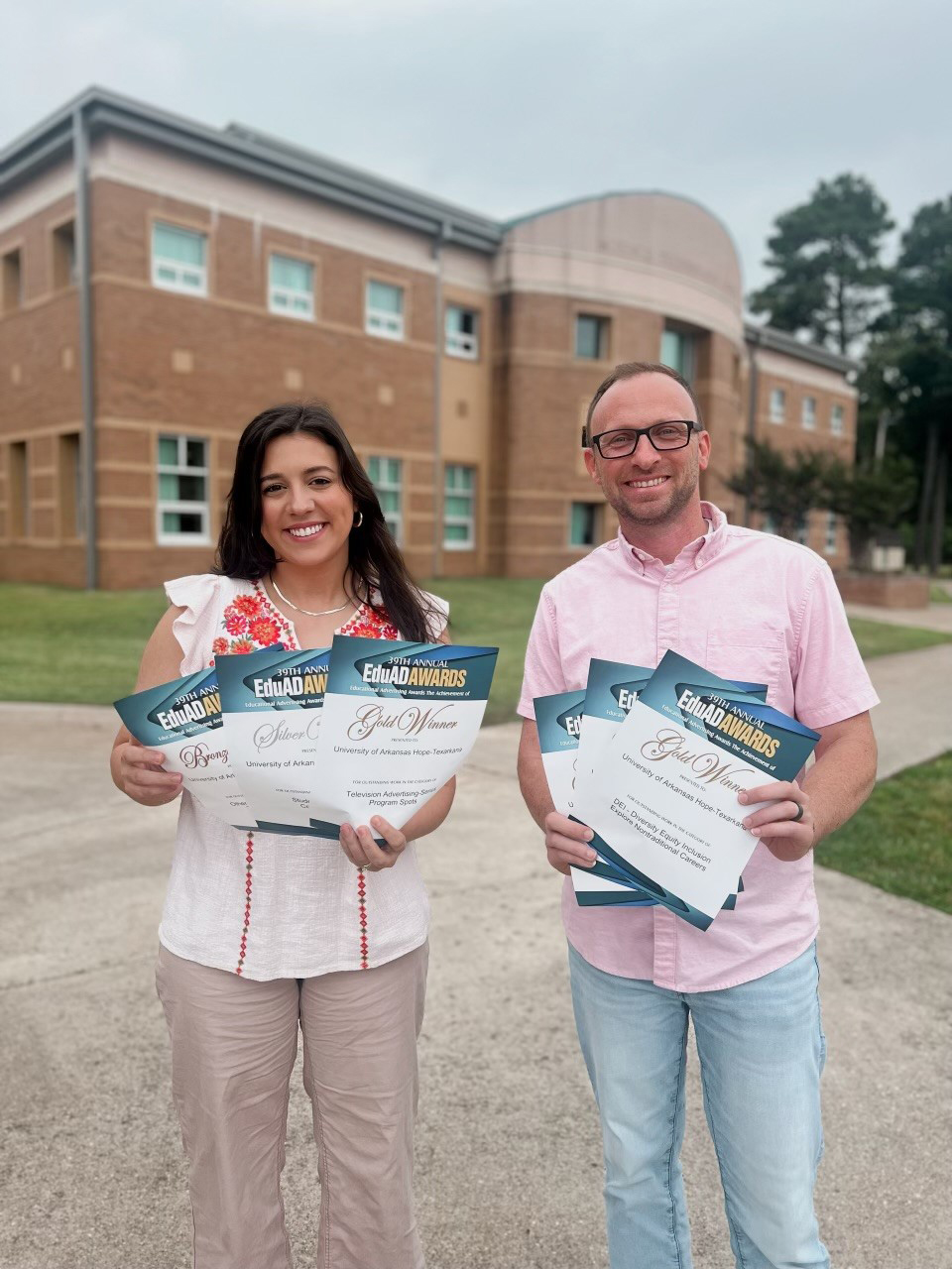 Carol Ann Milam, Graphic, Social Media, and Web Coordinator, and Casey Curtis, Communications Coordinator.