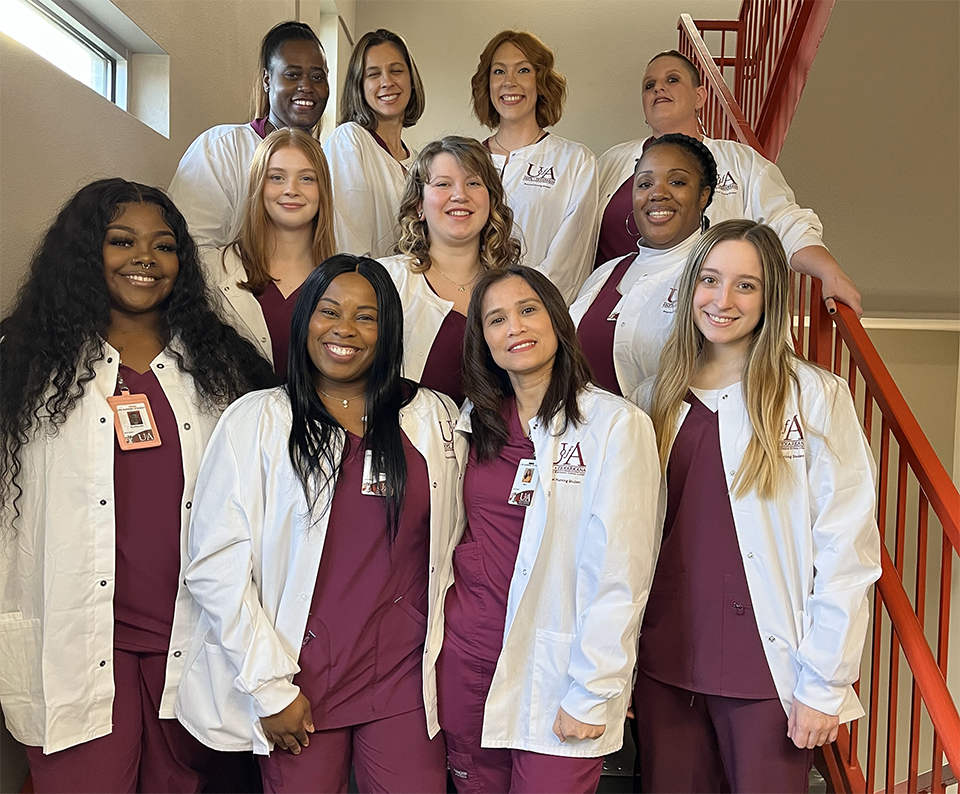 Pictured Front Row left to right: Gladajah Haynes, Kaleshia Butler, May Emphasis, Olyvia Davis - Second Row left to right: Cara Pogue, Ainslee Doggett, Danielle Purifoy - Back Row left to right: DiAisha Allen, Jenna Bolster, Haley Malone, Lisa Rhodes