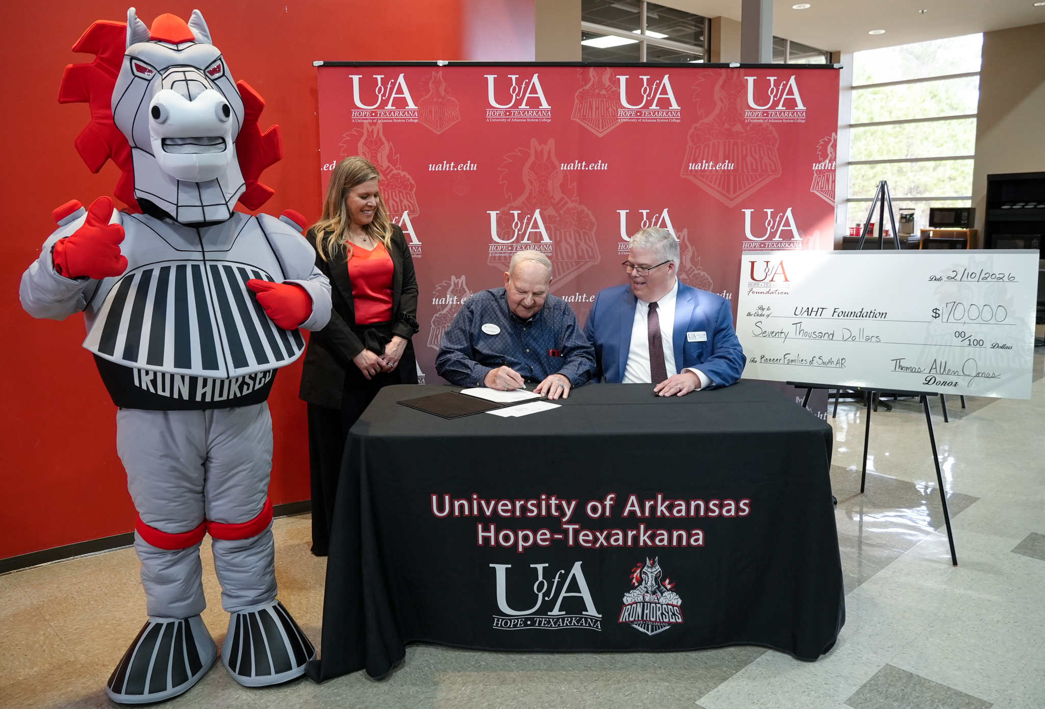 Pictured left to right: Spike the Iron Horse, Kelly Wilcox, Thomas Allen Jones, and Dr. Ricky Tompkins