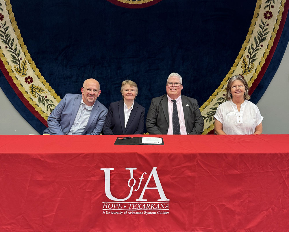 Pictured left to right: David Gordon, CMU Associate Dean of Academic Partnerships; Dr. Rita Gulstad, CMU Provost; Dr. Ricky Tompkins, UAHT Chancellor; and Laura Clark, UAHT Vice Chancellor for Academics